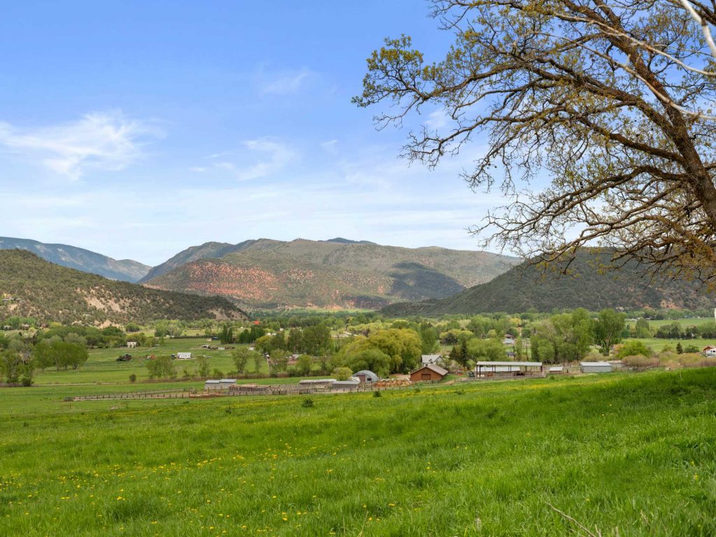 Known as The West Ranch, this Roaring Fork Valley legacy compound comprises 125 picturesque acres that include preserved open spaces and offer vistas of red rock ranges.