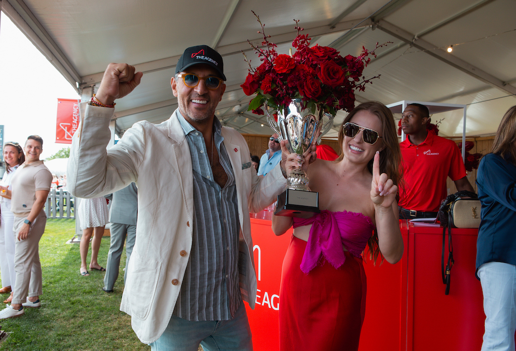 Mauricio Umansky and Makenzie Green with The Agency's trophy