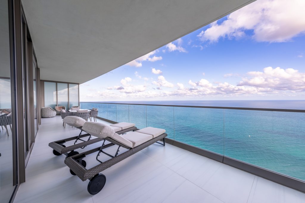 Set within the stunningly stylish Residence by Armani Casa, this condo invites you to soak in epic sea views from two expansive balconies, which provide stunning views to the East and West.