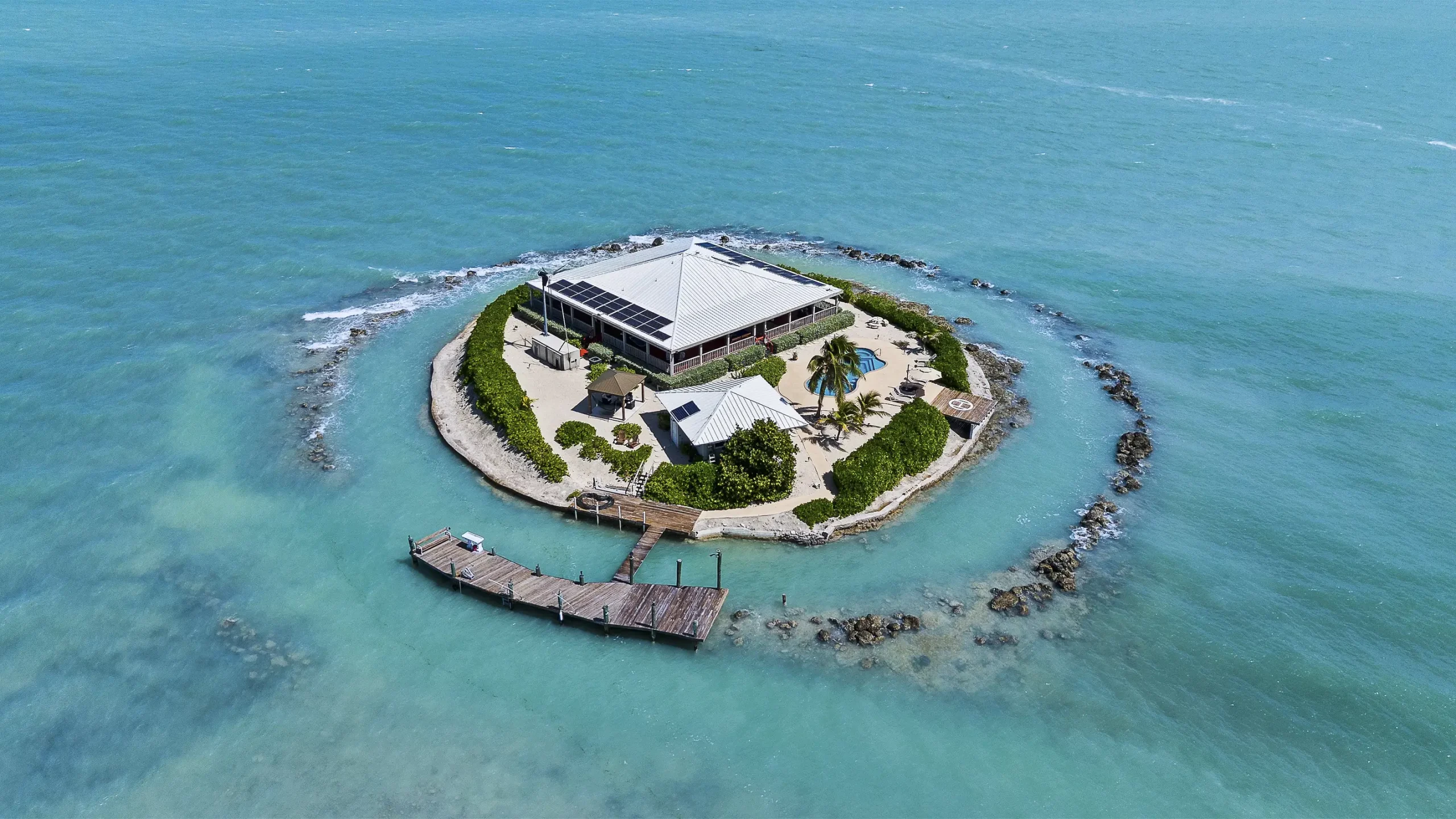 A gem amidst the azure waters of the Florida Keys, East Sister Rock is a lavish private island encompassing 1.37 acres of pristine paradise and an impressive 800 feet of water frontage.